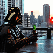 darth vader is holding a green bottle in front of a city