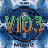 an advertisement for v103 music shows a microphone and the words on air