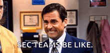 a man in a suit and tie is making a funny face and saying sec teams be like .