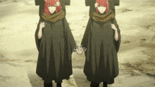 two anime characters are holding hands in a desert