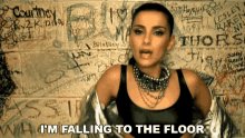 Im Falling To The Floor Nelly Furtado GIF - Im Falling To The Floor Nelly Furtado Do It Song GIFs