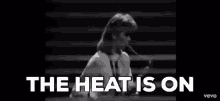 The Heat Is On Music GIF - The Heat Is On Music Musical Instrument GIFs