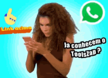 a woman with curly hair is looking at a cell phone with a whatsapp logo in the background