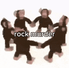 a group of stuffed monkeys are dancing in a circle holding hands .