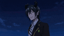 a man with horns on his head is standing in front of a fireworks display