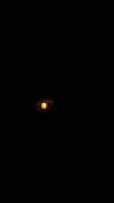 a person is surrounded by flames and smoke in the dark