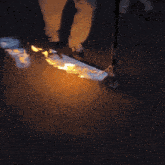 a drawing of a person with flames coming out of their hands