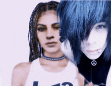 a girl with braids and a boy with blue hair are standing next to each other