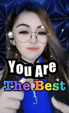 a woman giving a thumbs up with the words " you are the best " above her