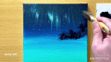 a person is painting a picture of the aurora borealis