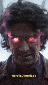 a man with glowing red eyes and the words here is america 's on the bottom