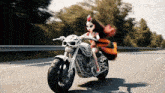 a doll is riding a motorcycle on a highway with pixverse.ai in the corner