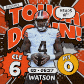 a football player with the number 4 on his jersey is holding a football