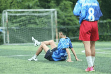 a soccer player with the number 8 on their jersey