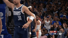 a basketball player wearing a jersey with the number 31