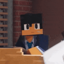 a minecraft character in a suit and tie is sitting at a desk .