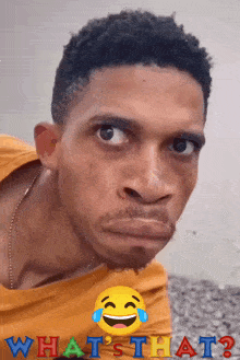 a man making a funny face with the words " what 's that " behind him