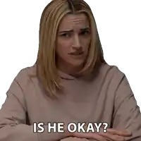 a woman with her arms crossed and the words is he okay below her