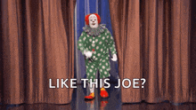 a clown in a green and white polka dot outfit is dancing with the words like this joe behind him