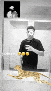 a man is taking a picture of himself with a cheetah in front of a mirror ..