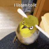 a bird with a stick on its head and the words " i listen to it " on the bottom