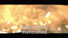 lee x kitty mentioned is written in white on a yellow background