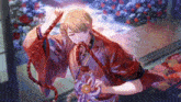 a man in a red kimono is holding a rope in his mouth
