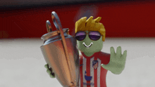 a cartoon character holding a trophy with a smiley face on it