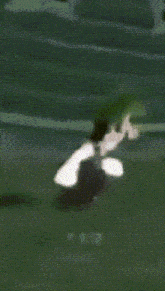 a pixelated image of a green and white leaf