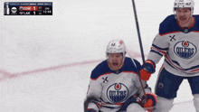 a hockey game is being played between the edmonton oilers and the lak