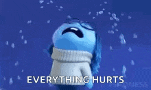 a cartoon character is crying with the words `` everything hurts '' written below him .