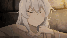 a girl with white hair is smiling and making a face