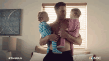 Holding My Babies Kevin Pearson GIF - Holding My Babies Kevin Pearson Justin Hartley GIFs