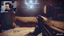 a man is playing a video game with a watermark that says ' y2 beta ' on it