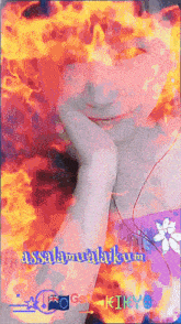 a woman 's face is surrounded by flames and the words a selamat alaikum
