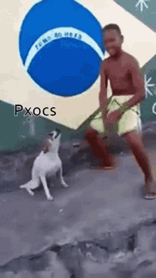 a man and a dog are dancing in front of a flag that says pxocs