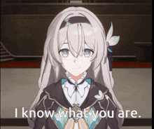 a girl with long white hair is smiling and says i know what you are