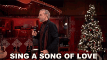 Sing A Song Of Love Neil Diamond GIF - Sing A Song Of Love Neil Diamond Christmas Medley Song GIFs