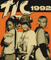 a black and white photo of three women with the year 1992