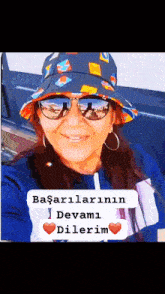 a woman wearing a hat and sunglasses is smiling with the words " başarilarinin devami dilerim " above her