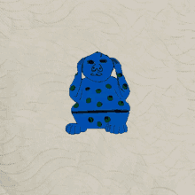 a drawing of a blue monster with green spots on it