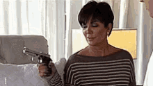 Kris Jenner GIF - Kris Jenner Gun GIFs