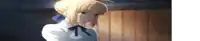 a blonde anime girl is standing in front of a wooden wall and looking down .