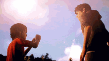 a man and a boy standing next to each other