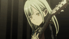 a girl with long white hair is holding a guitar and looking down