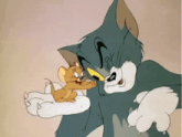 a cartoon of tom and jerry playing with each other with jerry holding tom 's paw
