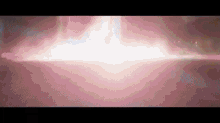 a close up of a pink light coming out of the ground
