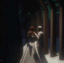 a bride and groom are standing in a dark forest