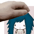 a hand is holding a cartoon character with blue hair .