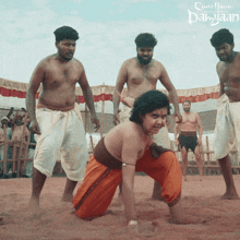 a poster for a movie called damyaan shows a group of men